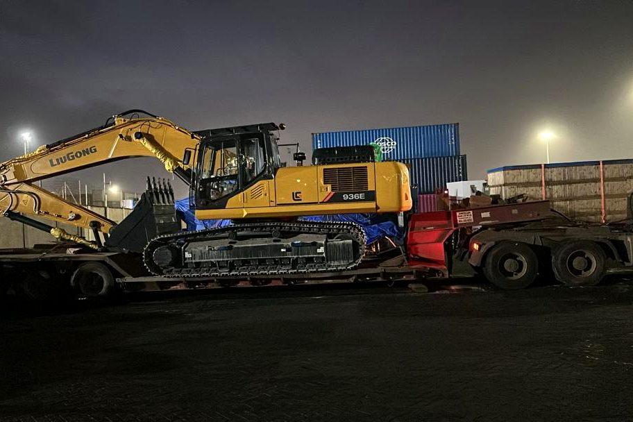LiuGong 936E excavator on lowbed trailer for project cargo haulage in Ghana