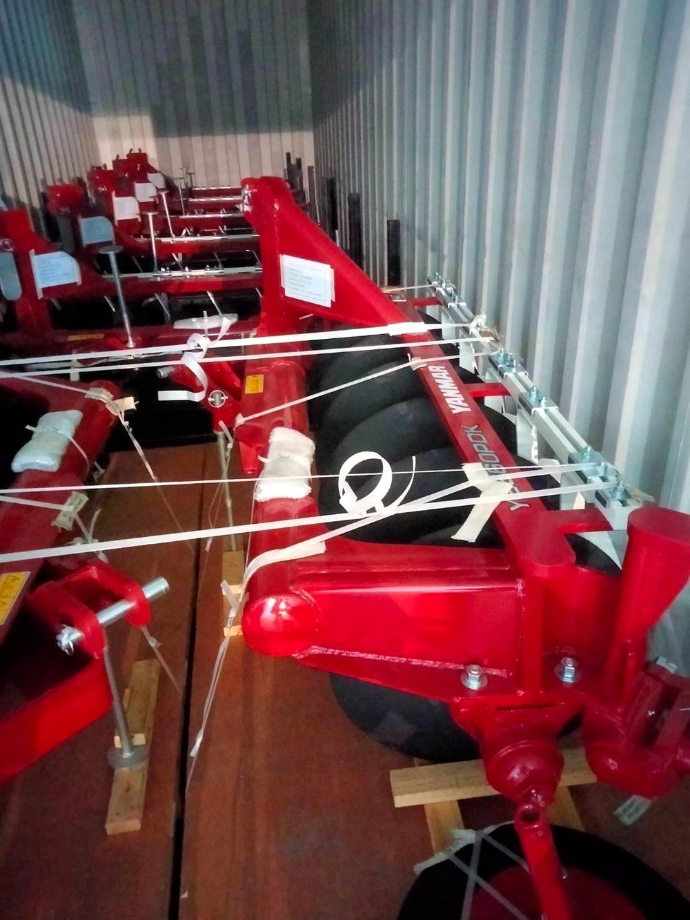 Yanmar agricultural implements packed and lashed in a container for import into Ghana
